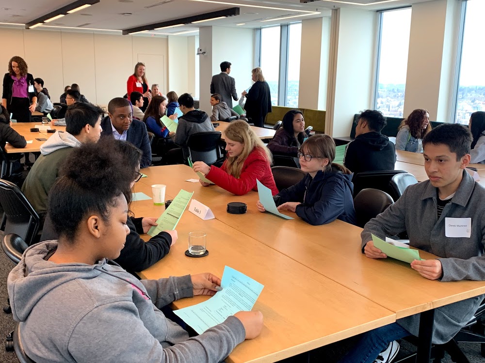 Students from Jefferson High School learn how to negotiate at the law firms of Davis Wright Tremaine LLC.