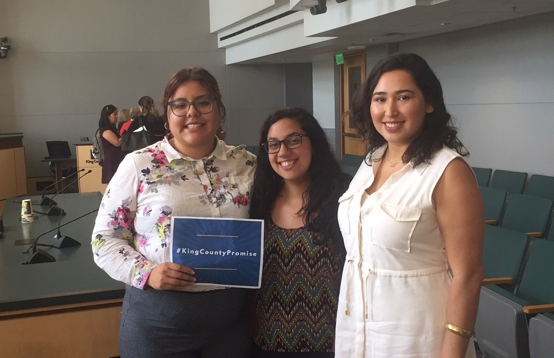 Community Center for Education Results College & Career coordinator Larissa Reza and manager Alejandra Pérez with UW Gear Up Achievers assistant director Marycarmen Becerra-Nuñez at the King County Council PSTAA hearing on Aug. 28.