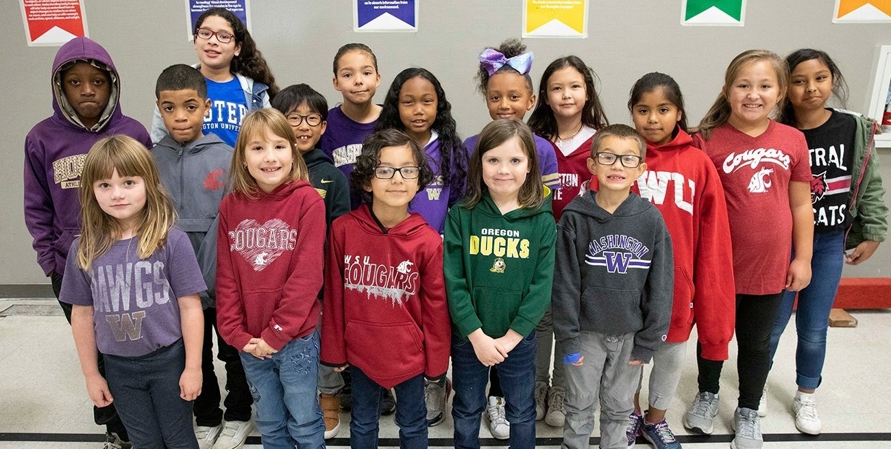 Students from Brigadoon Elementary School in Federal Way show off their college gear during DiscoverU 2019